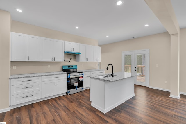 kitchen with dark hardwood / wood-style flooring, white cabinetry, stainless steel range, and sink