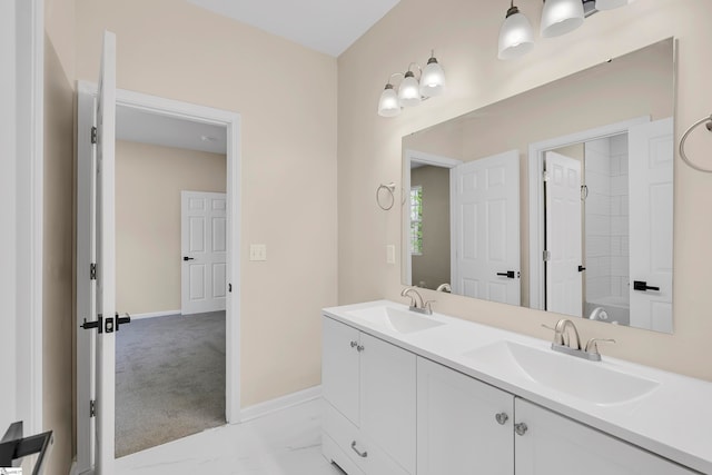 bathroom with a bathtub and vanity