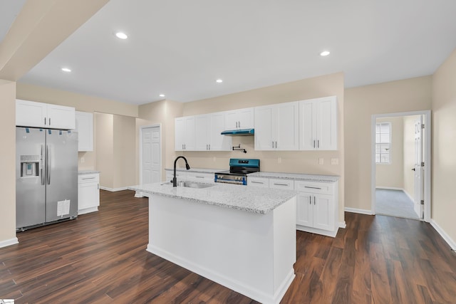 kitchen with appliances with stainless steel finishes, white cabinetry, sink, and dark wood-type flooring