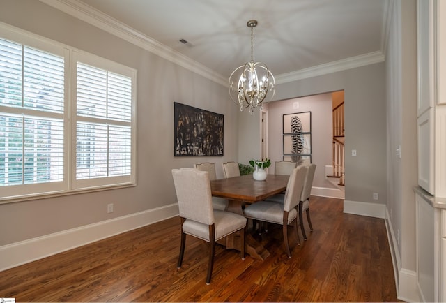 dining area featuring ornamental molding, dark hardwood / wood-style floors, and an inviting chandelier