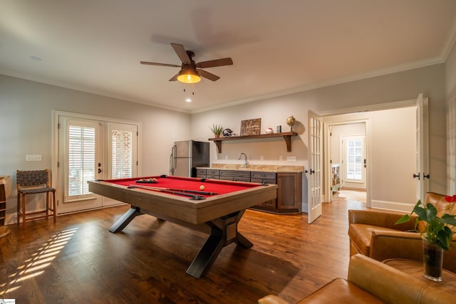 recreation room with billiards, french doors, hardwood / wood-style floors, ceiling fan, and ornamental molding