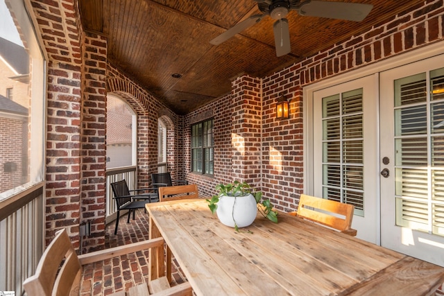 wooden terrace featuring a ceiling fan