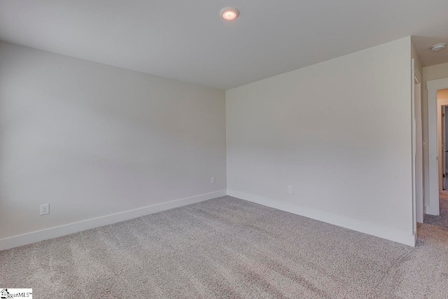 unfurnished room with carpet