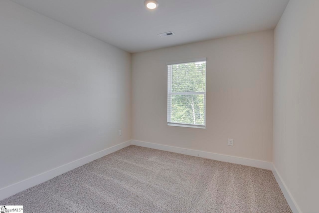 view of carpeted spare room