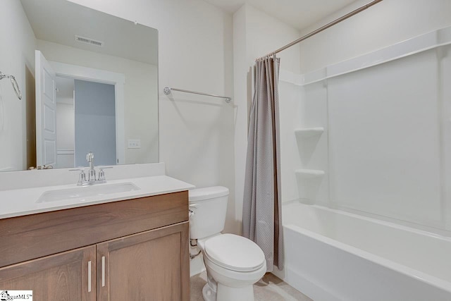 full bathroom featuring toilet, shower / tub combo, and vanity