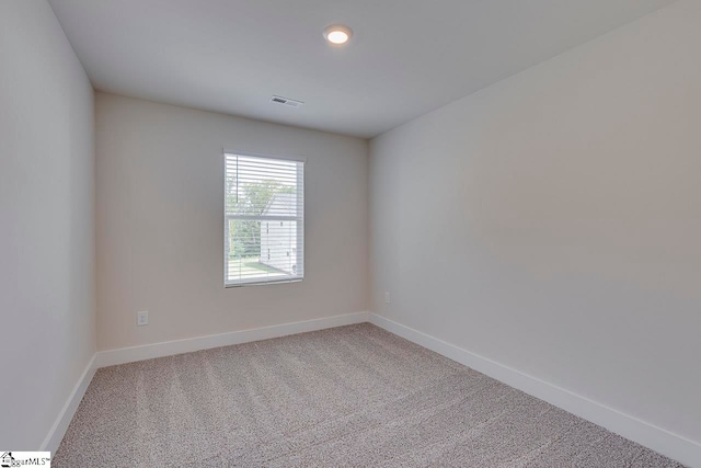 view of carpeted spare room