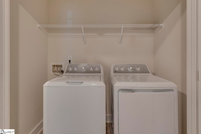 washroom with separate washer and dryer