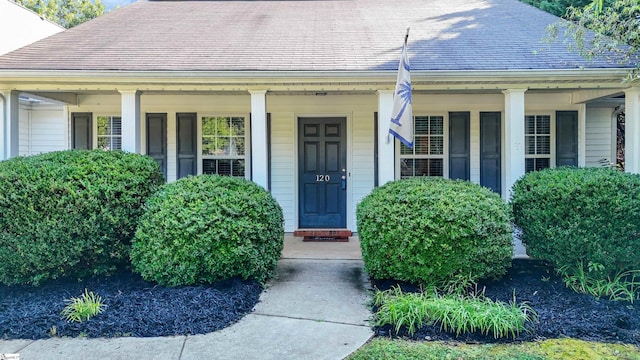 property entrance with a porch