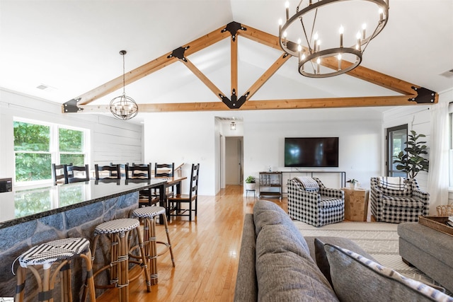248 Bay View Dr, Salem, SC 29676 - living area featuring light wood-style flooring, beamed ceiling, visible vents, a notable chandelier, and high vaulted ceiling