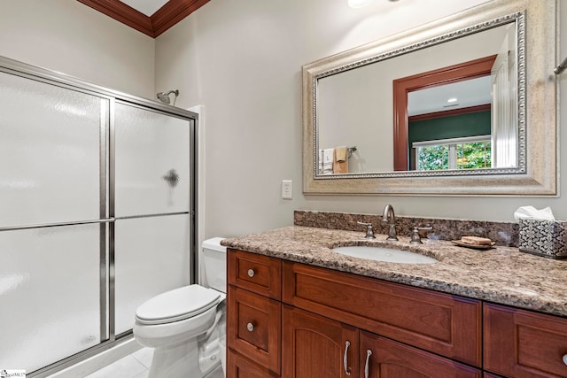 bathroom featuring tile patterned flooring, an enclosed shower, toilet, vanity, and ornamental molding