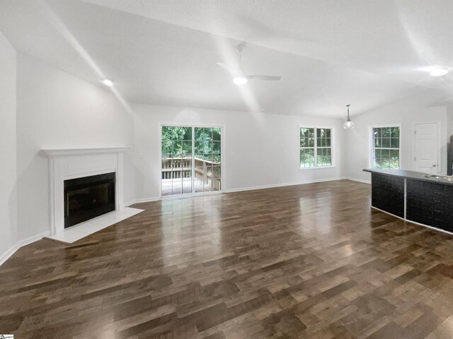 interior space featuring lofted ceiling and light colored carpet