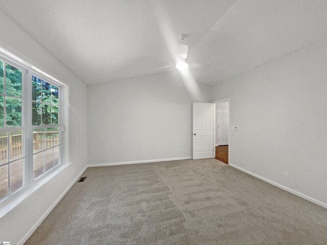 bathroom with hardwood / wood-style floors, toilet, and a textured ceiling