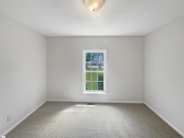 unfurnished bedroom featuring carpet flooring, a closet, and ceiling fan