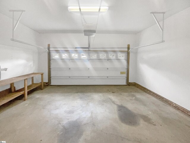 unfurnished living room featuring dark wood-type flooring, ceiling fan, lofted ceiling, and a healthy amount of sunlight