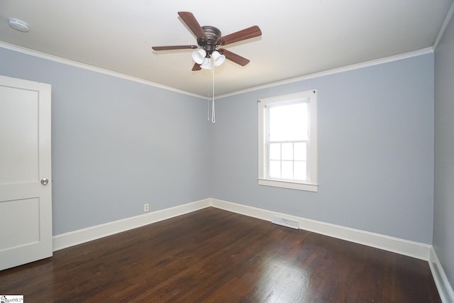 unfurnished room with crown molding, dark wood-type flooring, and ceiling fan