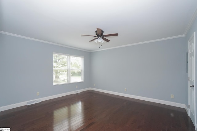 unfurnished room featuring ceiling fan, dark hardwood / wood-style floors, and ornamental molding