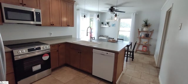 362 Green Hill Dr, Anderson, SC 29621 - kitchen with a peninsula, a sink, a ceiling fan, light countertops, and appliances with stainless steel finishes