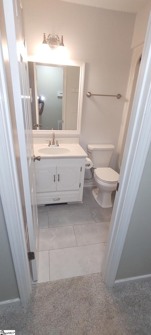 362 Green Hill Dr, Anderson, SC 29621 - bathroom featuring toilet, vanity, and tile patterned floors