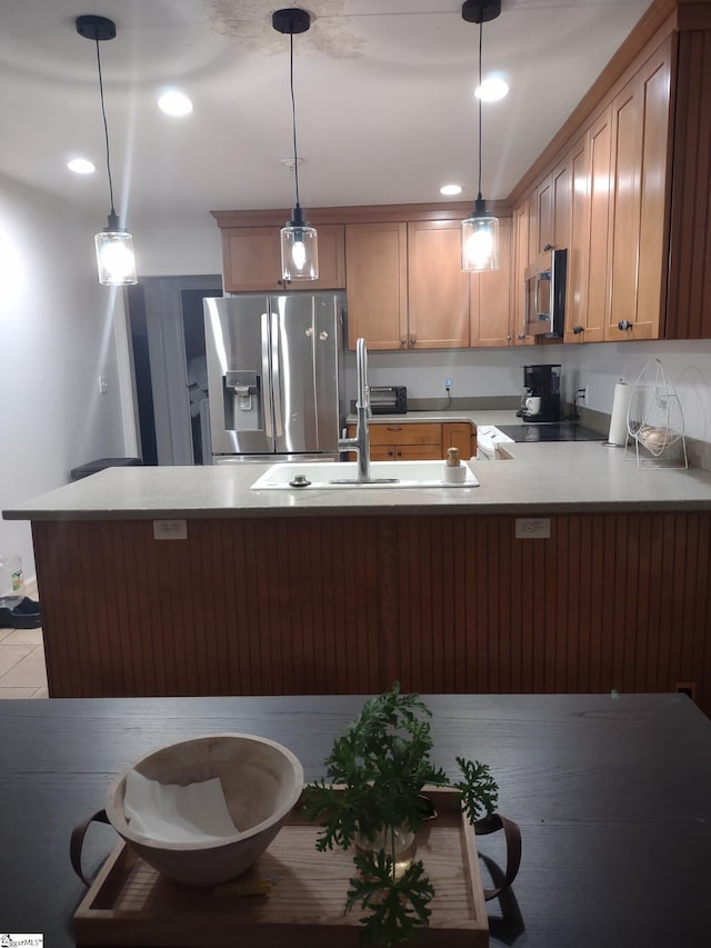 362 Green Hill Dr, Anderson, SC 29621 - kitchen with a peninsula, a sink, recessed lighting, pendant lighting, and appliances with stainless steel finishes