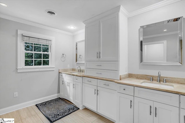 interior space with crown molding, sink, and white cabinets