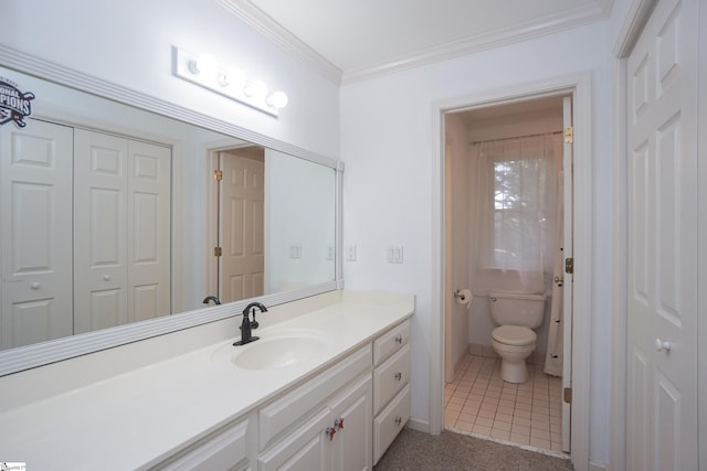 bathroom featuring ornamental molding, toilet, tile patterned flooring, and vanity