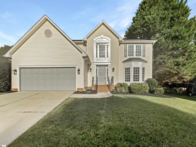 view of property featuring a front yard