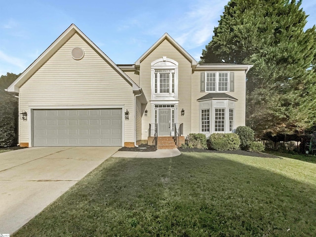 traditional-style house with a garage, concrete driveway, and a front lawn