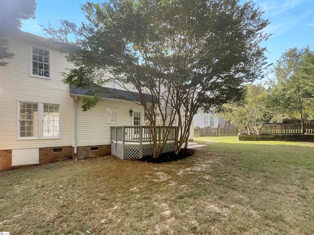 view of yard featuring a wooden deck