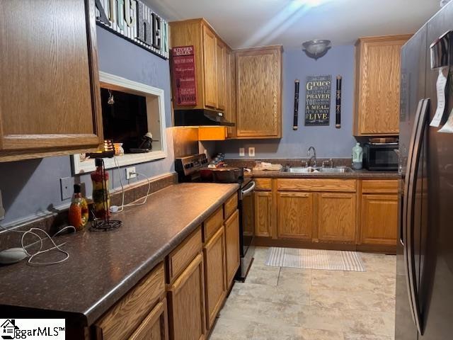 kitchen featuring stainless steel appliances and sink