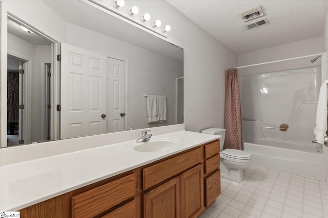 full bathroom featuring a textured ceiling, vanity, toilet, and shower / bath combo with shower curtain