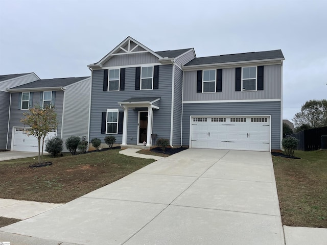 view of front of house featuring a garage, concrete driveway, and board and batten siding