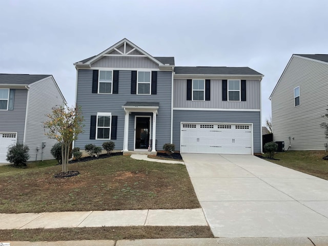 view of front of house featuring driveway, board and batten siding, a garage, and central AC