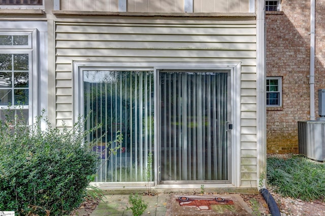 exterior space featuring central air condition unit