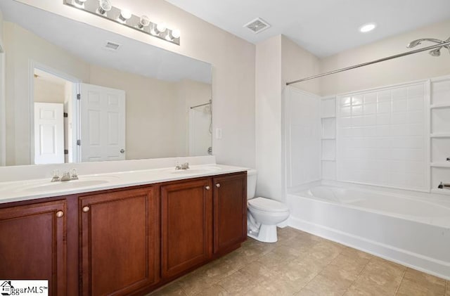 full bathroom with vanity, toilet, and shower / tub combination