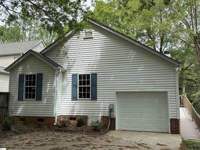 5 Townes Creek Ct, Greenville, SC 29609 - view of side of home featuring an attached garage, crawl space, and concrete driveway