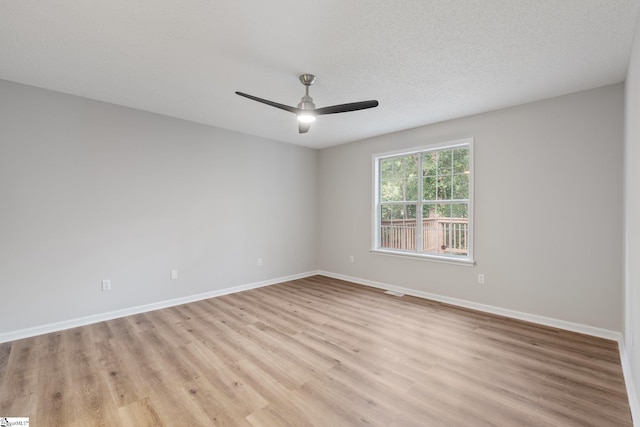 5 Townes Creek Ct, Greenville, SC 29609 - spare room with light wood-type flooring, baseboards, and a ceiling fan