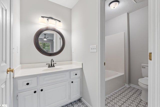 5 Townes Creek Ct, Greenville, SC 29609 - bathroom with vanity, baseboards, tile patterned floors, a textured ceiling, and toilet