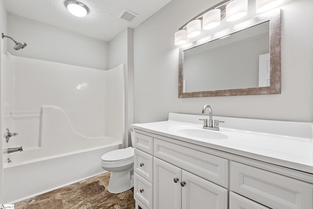 full bathroom with vanity, toilet, a textured ceiling, and shower / washtub combination