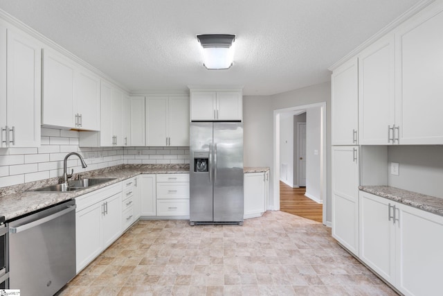 5 Townes Creek Ct, Greenville, SC 29609 - kitchen featuring a sink, white cabinets, and stainless steel appliances