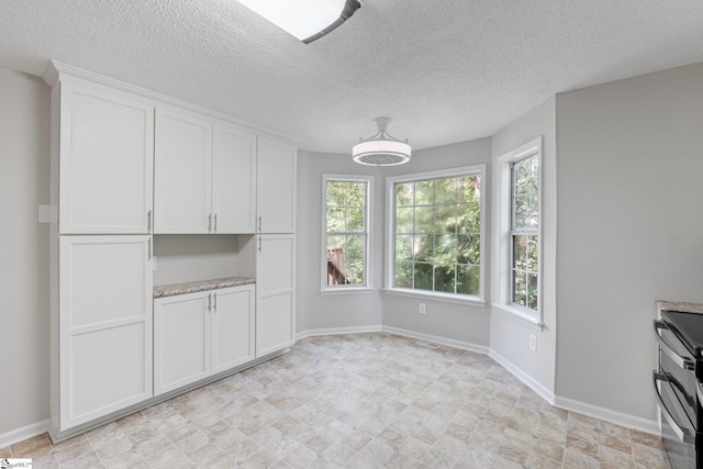 5 Townes Creek Ct, Greenville, SC 29609 - interior space featuring baseboards and a textured ceiling