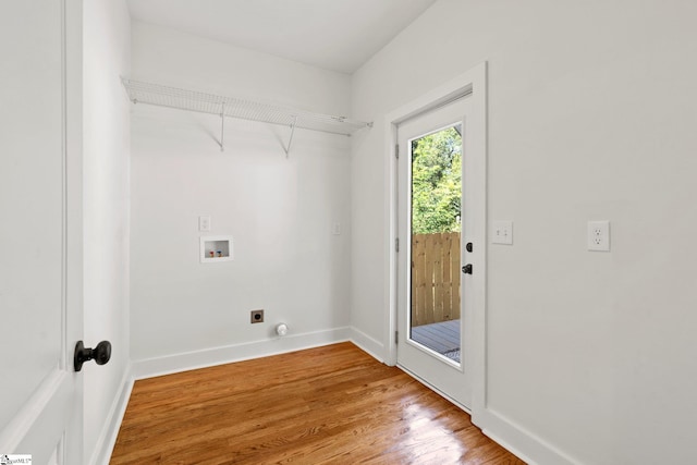 laundry room with light wood-type flooring, washer hookup, and hookup for an electric dryer