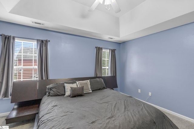 unfurnished bedroom featuring ceiling fan and carpet flooring