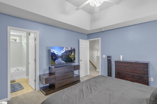 bedroom featuring ensuite bath and ceiling fan