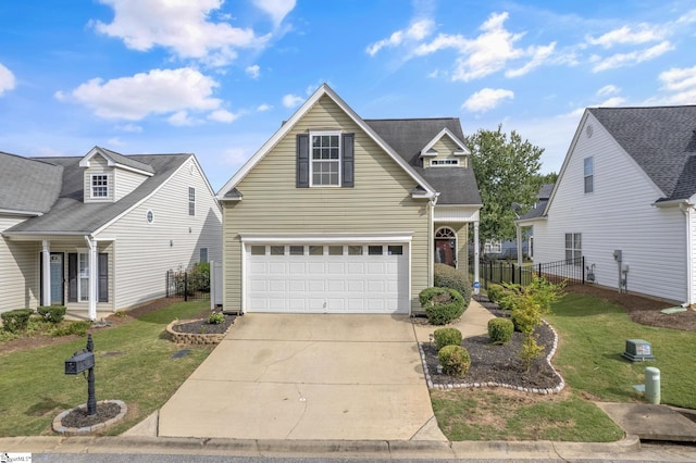 view of front facade featuring a garage and a front yard