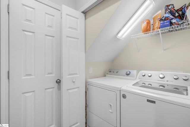 laundry area with independent washer and dryer