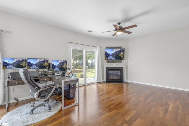 office area with ceiling fan and hardwood / wood-style floors