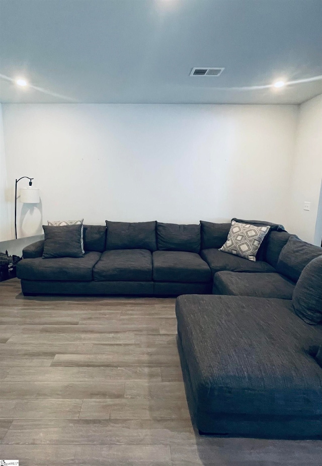 living room with light hardwood / wood-style flooring