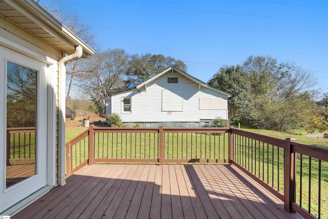 deck featuring a lawn