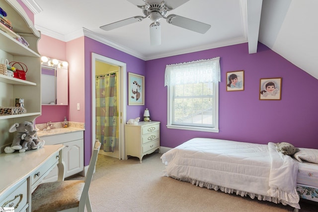 carpeted bedroom with sink, ensuite bathroom, ceiling fan, crown molding, and lofted ceiling with beams