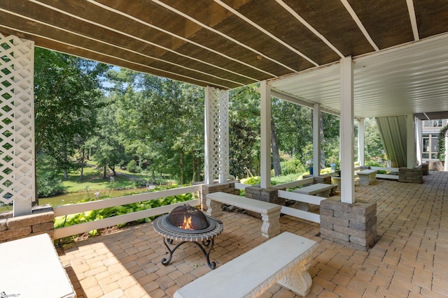 view of patio / terrace featuring a fire pit